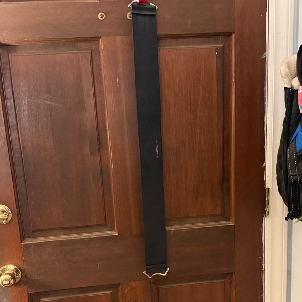 Wide Black Elastic Belt with Silver Buckle, Looks Like Leather.